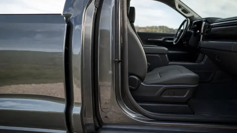 An open driver's door showing the door jamb