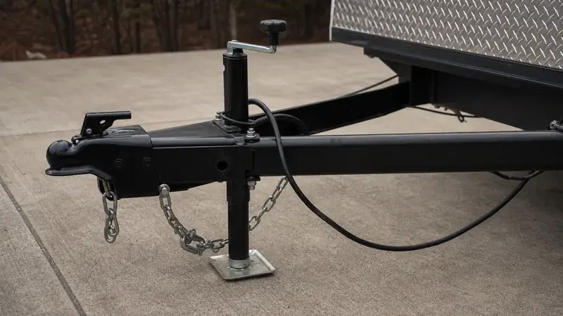 A trailer tongue with its jack and coupler