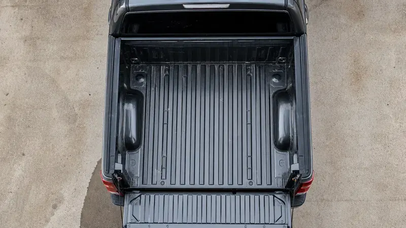 Looking down into an empty pickup bed